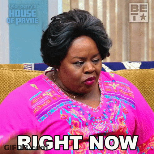 Woman On Couch Saying Right Now GIF