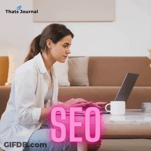 Woman On Couch Using Laptop SEO GIF