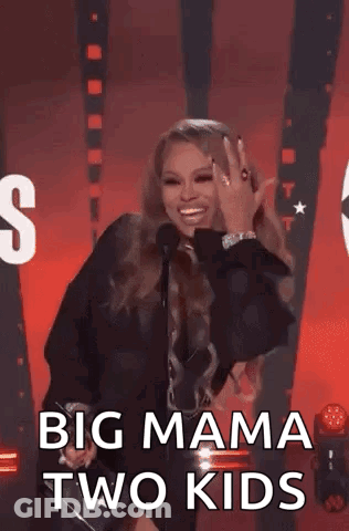 Woman On Stage Giving Thumbs Up With Microphone GIF