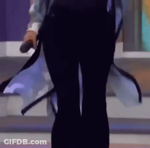 Woman On Stage Holding Microphone GIF