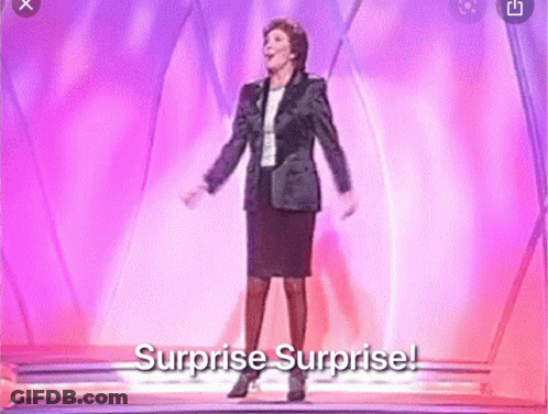 Woman On Stage With Surprise Surprise GIF
