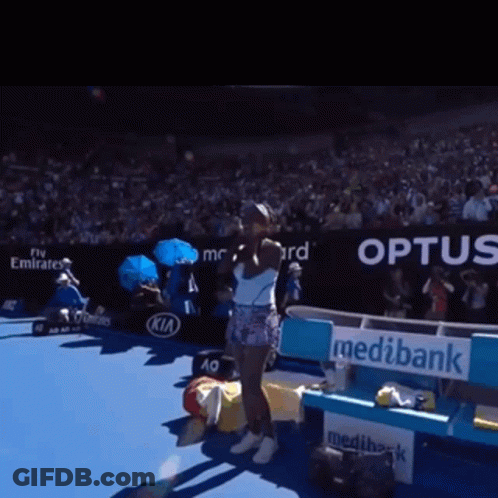 Woman On Tennis Court In Front Of Optus Sign GIF