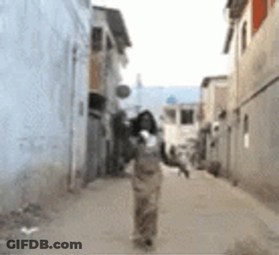 Woman On The Streets Making Announcement On Megaphone GIF