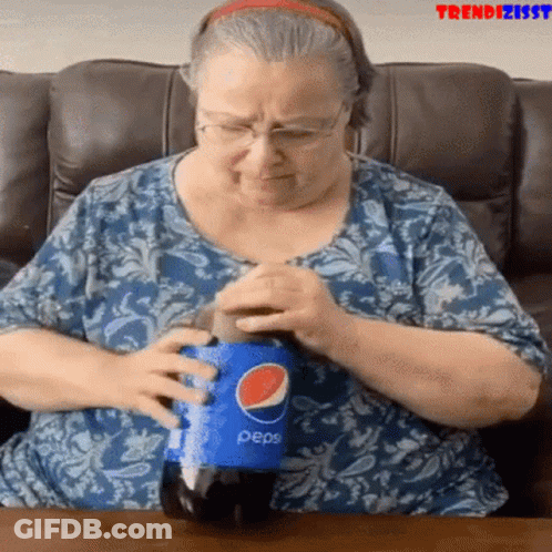 Woman Opening Pepsi Bottle GIF
