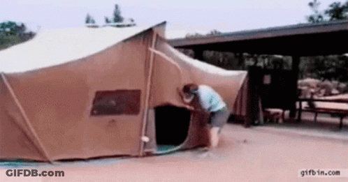Woman Opening Tent With Hose Attached GIF