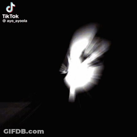 Woman Peeking From Back Of Car GIF