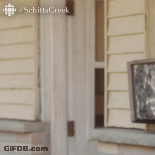 Woman Peeking Out Of Door #Schittscreek GIF