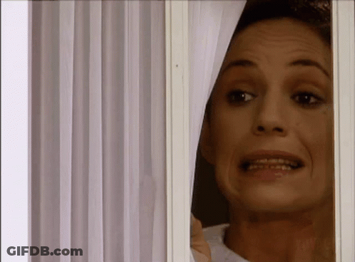 Woman Peeking Out Window Mouth Open GIF