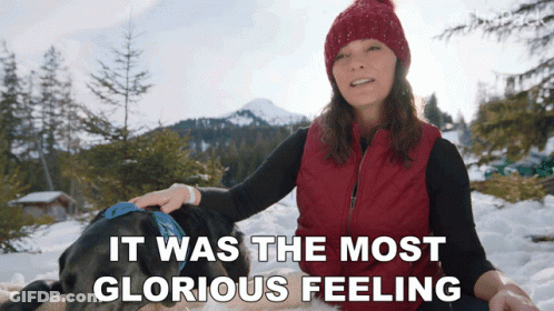 Woman Petting Dog In Snow Glorious Feeling GIF