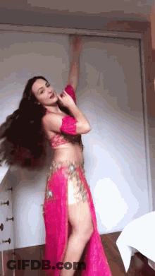 Woman Pink Costume Doing Belly Dance GIF