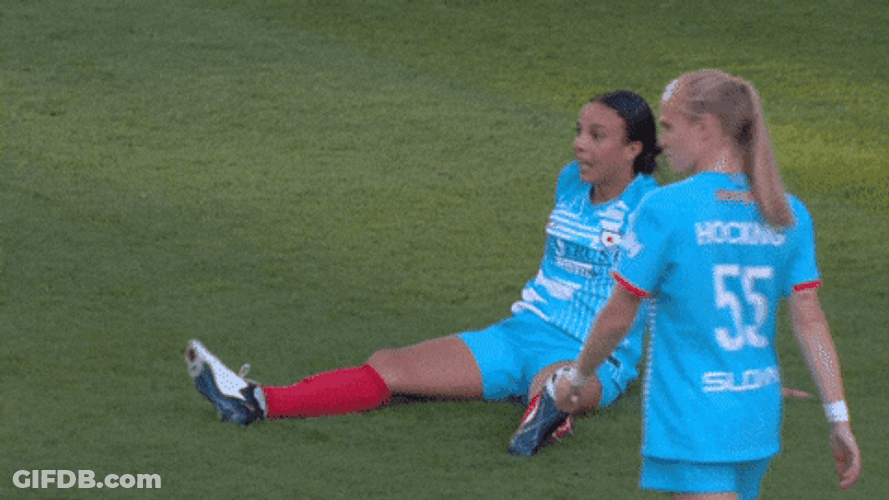 Woman Player Sit Down On Grass GIF