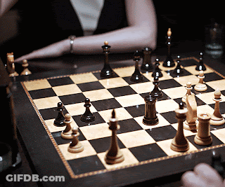 Woman Playing Chess GIF