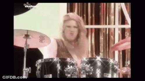 Woman Playing Drums On Stage GIF