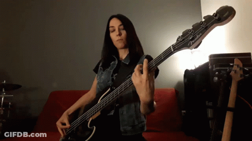 Woman Playing Fender Bass Guitar GIF