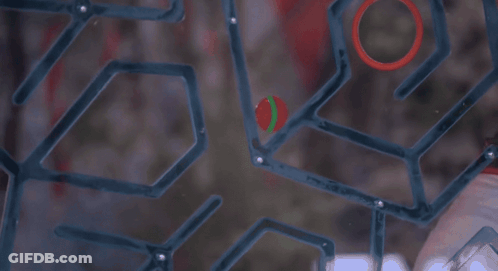 Woman Playing Game With Red Ball And Green Circle GIF