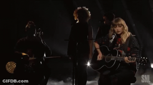 Woman Playing Guitar And Singing GIF