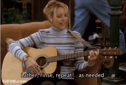 Woman Playing Guitar Saying Lather Rinse Repeat GIF