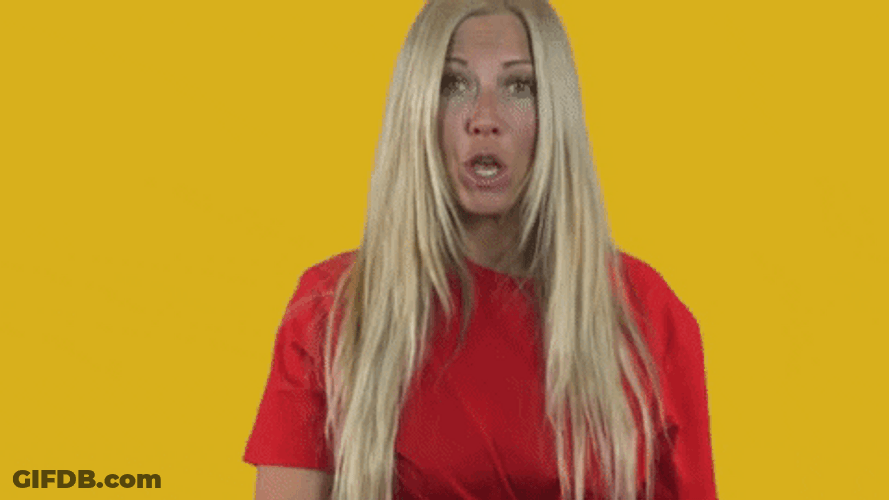 Woman Playing Imaginary Smallest Violin GIF