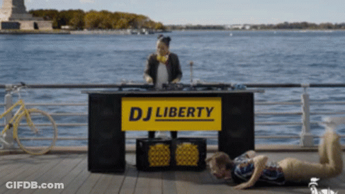 Woman Playing Music At DJ Liberty Stand GIF