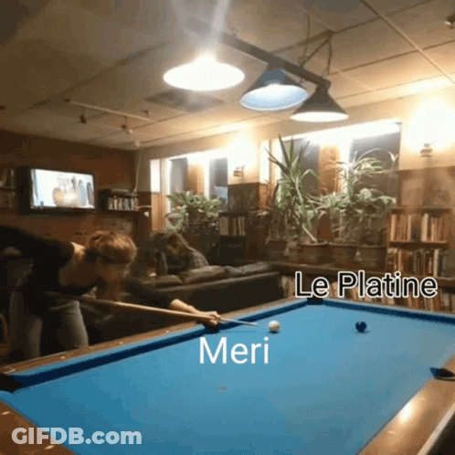 Woman Playing Pool With Meri On Table GIF
