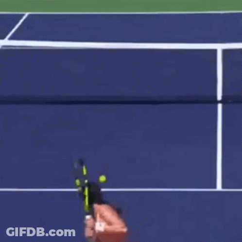 Woman Playing Tennis In Front Of BNP Pari Ad GIF
