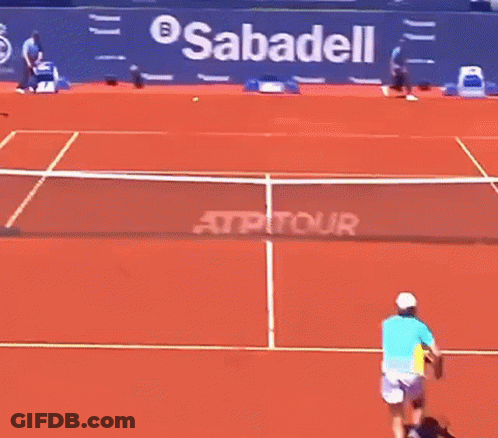 Woman Playing Tennis In Front Of BNP Pari Ad GIF