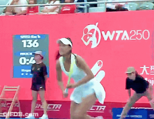 Woman Playing Tennis In Front Of WTA250 Banner GIF