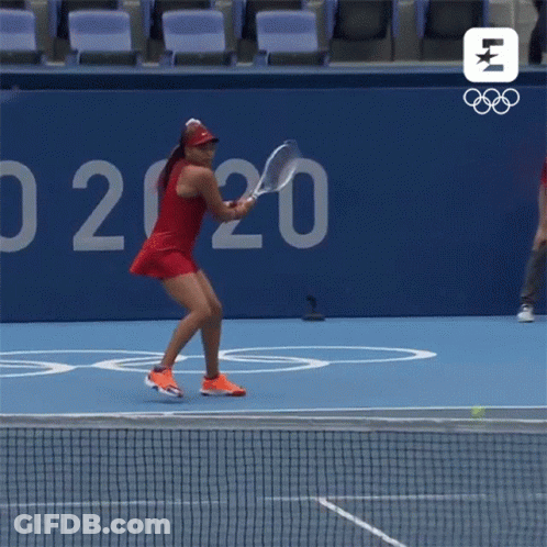 Woman Playing Tennis Near Yo 2020 Sign GIF