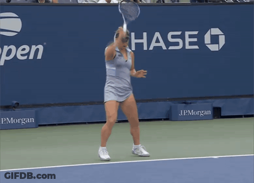 Woman Playing Tennis With Chase Sign GIF