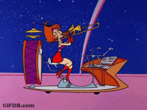Woman Playing Trombone With Drum And Keyboard GIF