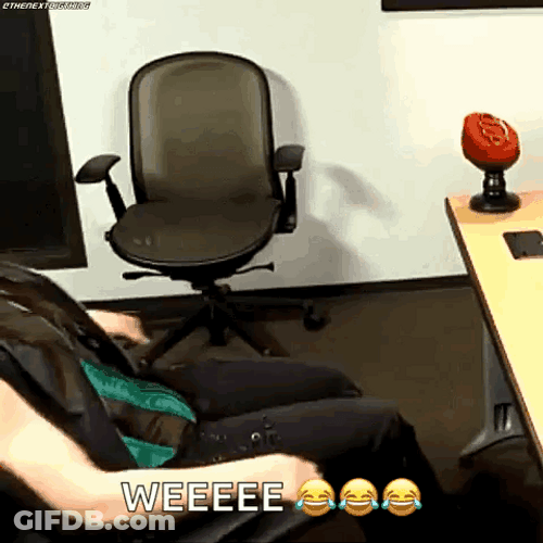 Woman Plays With Chair While Spinning GIF