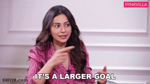 Woman Pointing And Saying Larger Goal GIF