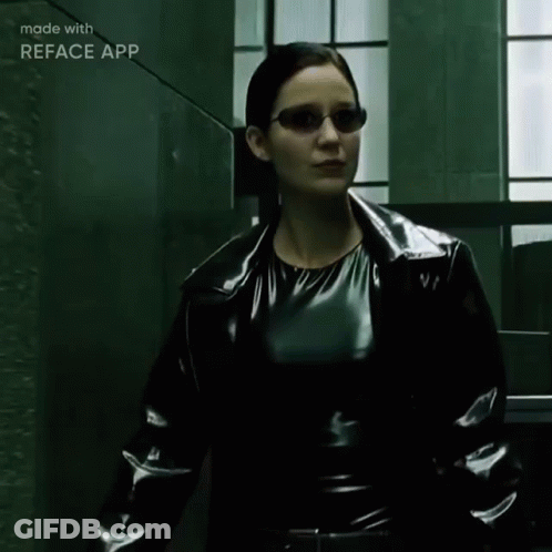 Woman Pointing Gun At Camera Made With Reface App GIF