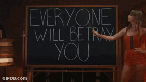 Woman Pointing To Blackboard: Everyone Will Betray You GIF
