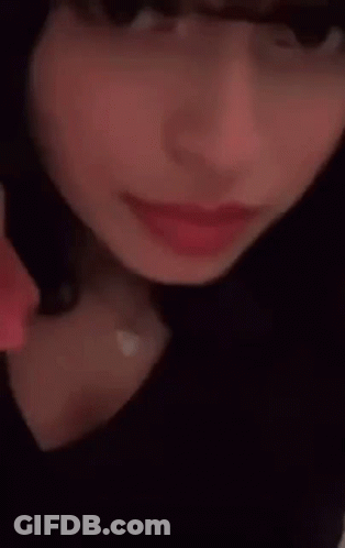 Woman Pointing To Forehead GIF