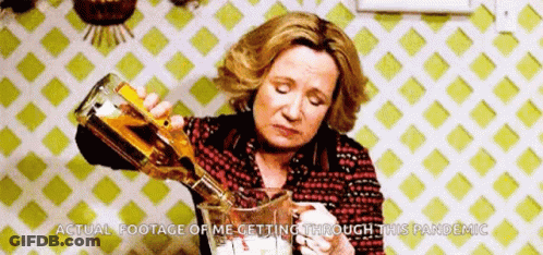 Woman Pouring Alcohol Into Pitcher GIF