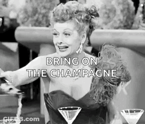 Woman Pouring Champagne Into Martini GIF