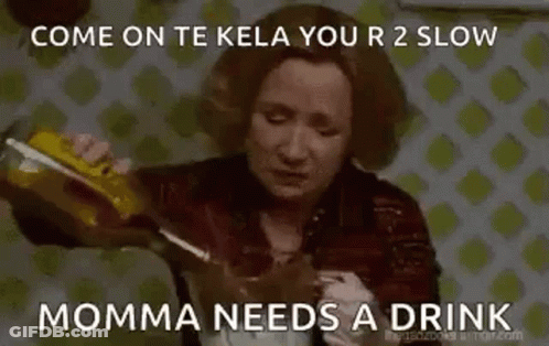 Woman Pouring Drink Into Glass GIF