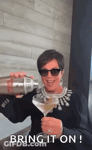 Woman Pouring Drink Into Martini GIF