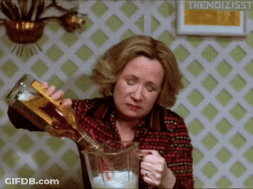 Woman Pouring Drink Into Pitcher GIF