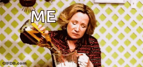 Woman Pouring Liquid Into Pitcher GIF