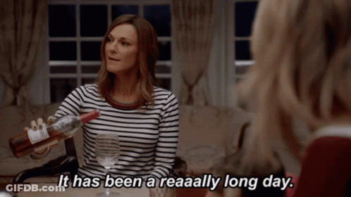 Woman Pouring Wine Says It Has Been A Reaaally Long Day GIF