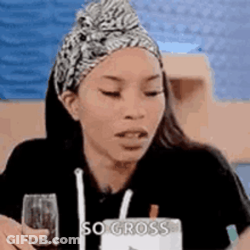 Woman Pulling Her Tongue Out Saying Gross GIF