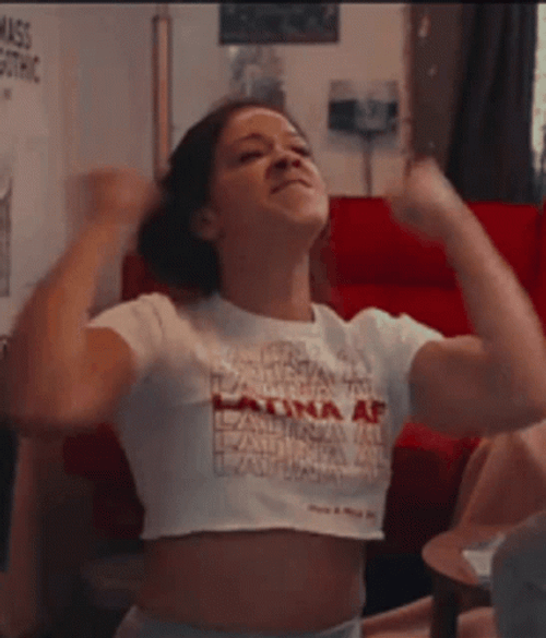 Woman Punching Air With Both Hands GIF