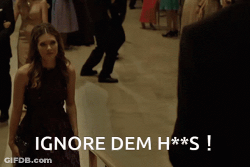 Woman Purple Dress Tells Man Ignore Dem H**s GIF