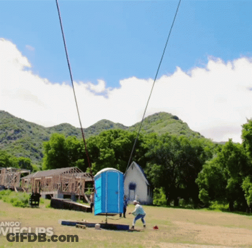 Woman Pushing Blue Portable Toilet Door Open GIF