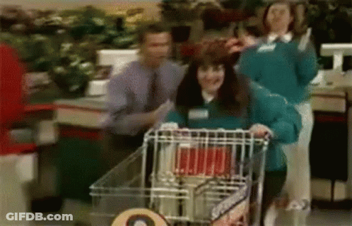 Woman Pushing Shopping Cart In Store GIF