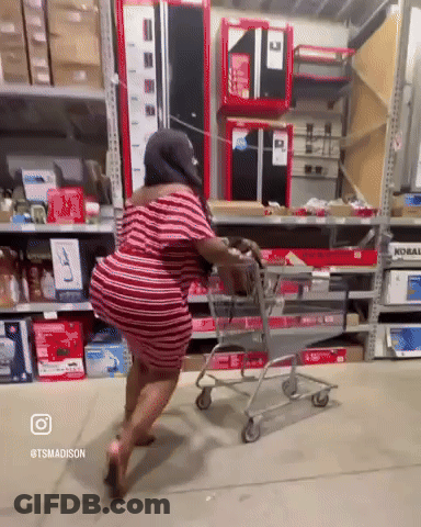 Woman Pushing Shopping Cart With @Tsmadison GIF