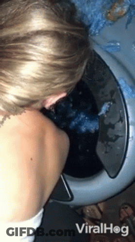 Woman Putting Clothes In Washing Machine Viralhog GIF
