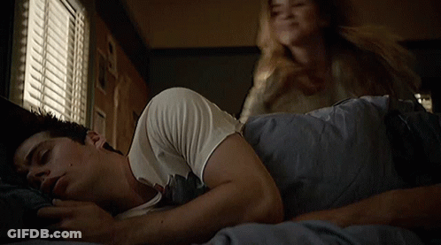 Woman Putting Hand On Sleeping Man's Chest GIF
